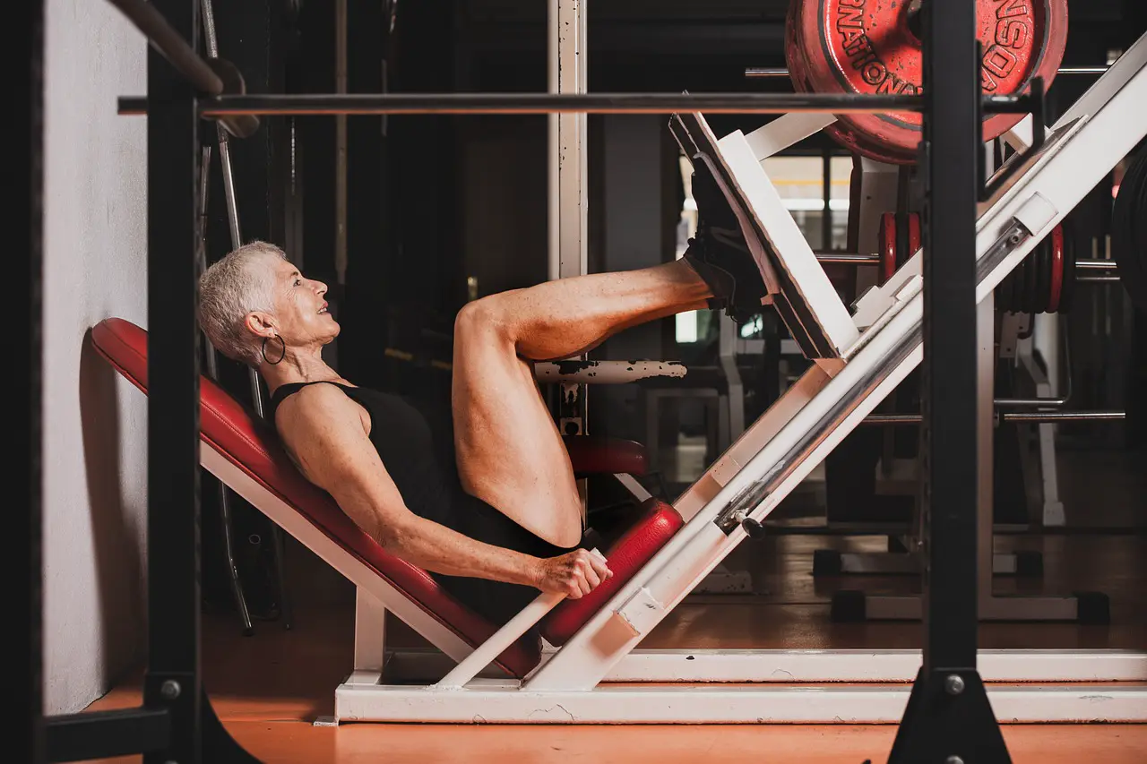 Older woman using active amenities to workout